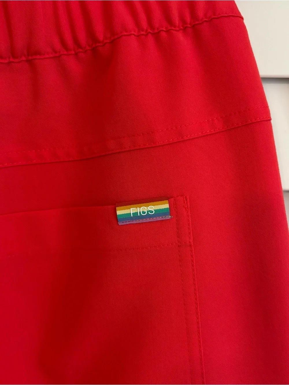 Figs men’s scrub set, medium. Dark coral/red with pride drawstring and tags.